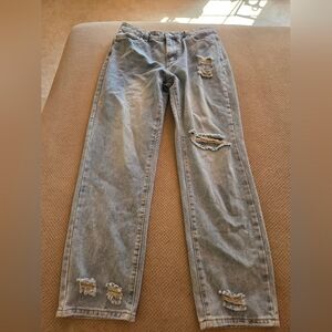 Women's large high rise distressed blue jeans. Women's 8-10